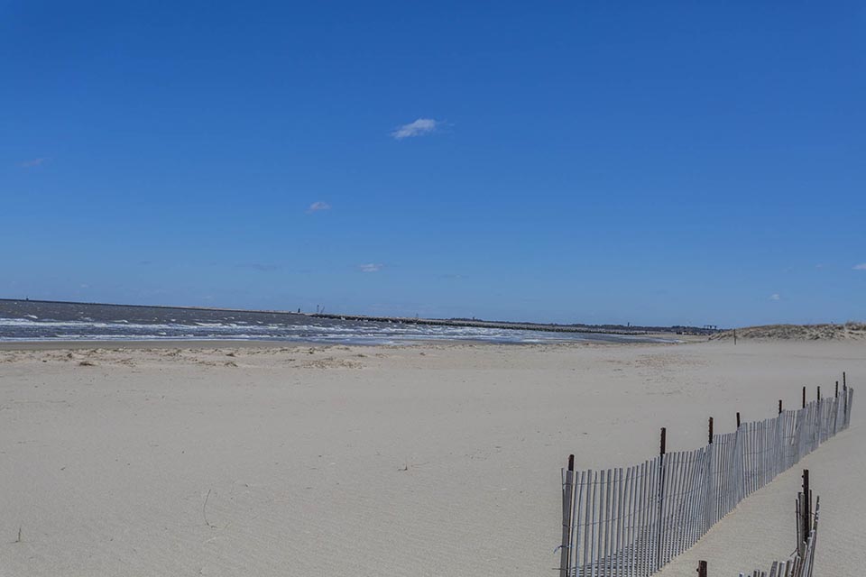 Beach with fence in Lewes, DE